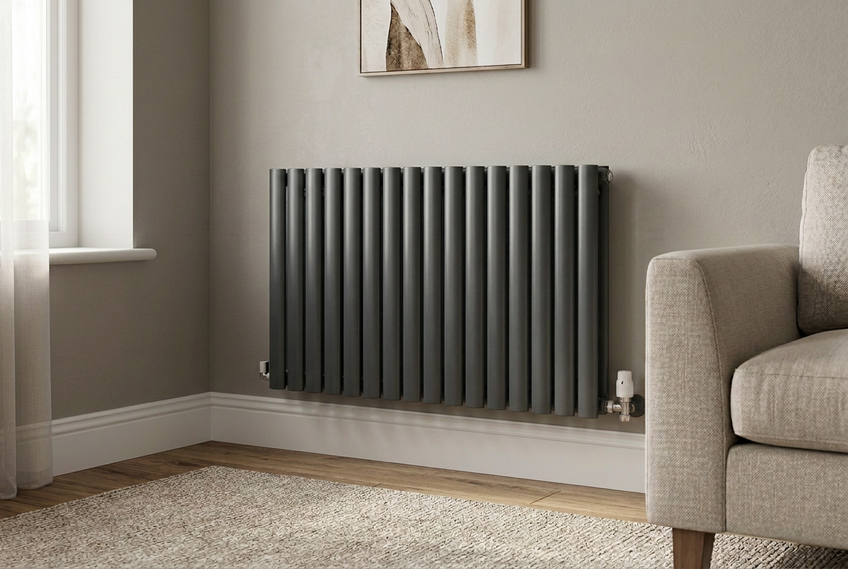 Anthracite Ovalco 600 × 1020 horizontal radiator in a living room