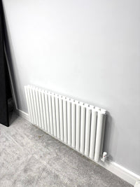 Oval Tube Horizontal Radiators are a stylish and efficient heating solution, combining contemporary design with effective heat distribution.  Their sleek, rounded tubes not only enhance the aesthetic appeal of a room but also provide substantial warmth.