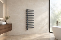 Anthracite oval tube designer towel rail in a wide spa-style bathroom