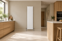 White vertical flat tube radiator in a contemporary kitchen