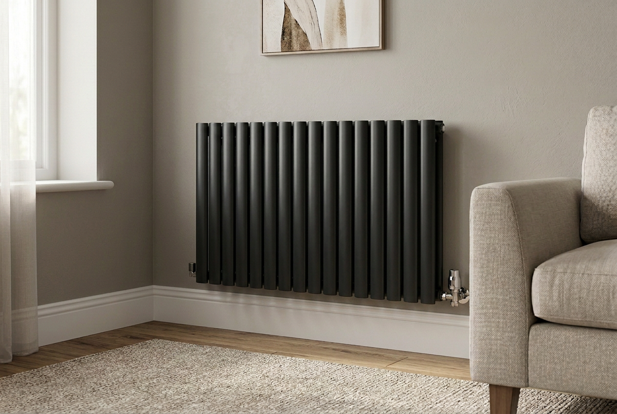 Black Ovalco 600 × 1020 horizontal radiator in a living room