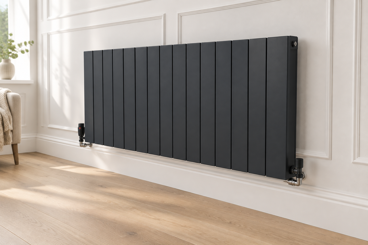 Dark aluminium horizontal radiator, side-angle lifestyle image